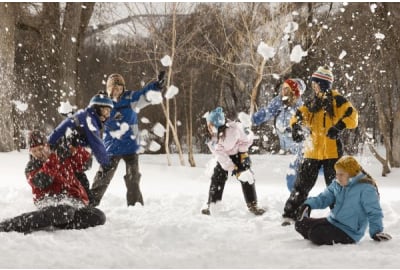 Scouts throw snowballs in a snowball fight