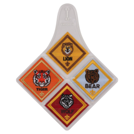 Cub Scouts Rank Badge Holder has four slots to hold all a Cub Scout's rank badges and attaches to the shirt via the button